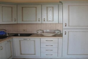 Fridge, oven, stovetop, high chair