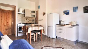 Fridge, oven, stovetop, high chair - Apartment in Costa Rei with Stunning Sea View (Costa Rei)