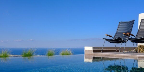 Executive Two Bedroom Suite with Private Heated Pool and Caldera View | Living area | 43-inch Smart TV with satellite channels, TV