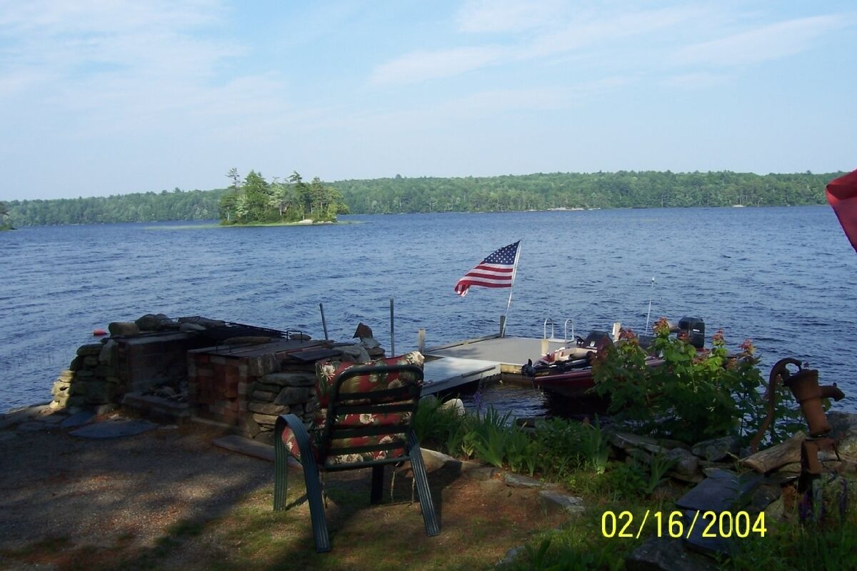 Lake front home with sandy beach and spectacular views