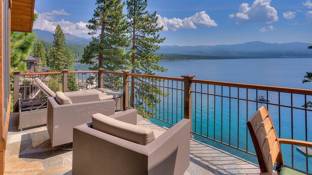 A balcony with outdoor furniture overlooking a lake and mountains. - Gonowabie Lodge - Crystal Bay Lakefront - TLUXP (Crystal Bay)