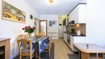 Apartment (Two Bedroom Apartment) | Private kitchen | Fridge