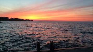 On the beach, sun-loungers, beach towels