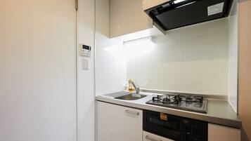 Fridge, microwave, stovetop, cookware/dishes/utensils