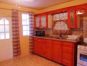 Fridge, microwave, oven, stovetop - ONE BEDROOM APARTMENT (Les Coteaux)