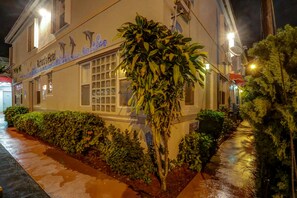 A building with a sign reading "Richard's Hotel" and a large plant in front. - Richard's Hotel (Hollywood)
