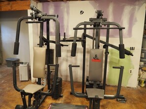 Work out in comfort with our gym featuring weight machines with padded seats and adjustable arms.