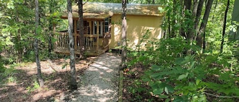 EXTERIOR:  The front of the cabin in the summer.  Note that "Hillbilly-chic" design.  ;-)