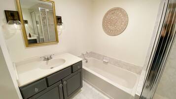 Bathtub, hair dryer, towels
