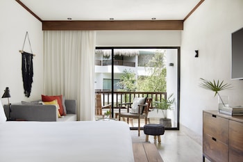 Room, 1 King Bed, Balcony (Essential) | Premium bedding, down comforters, in-room safe, blackout drapes at Kimpton Aluna Tulum by IHG