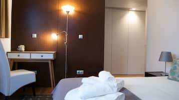 Desk, laptop workspace, blackout curtains, iron/ironing board