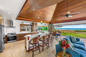 Enjoy a meal with a view from the central island, overlooking the ocean.