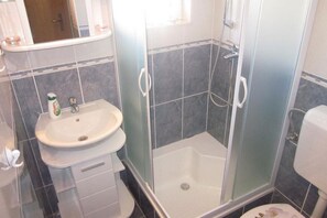 Regadera y secadora de cabello 