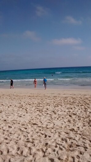 On the beach, beach towels