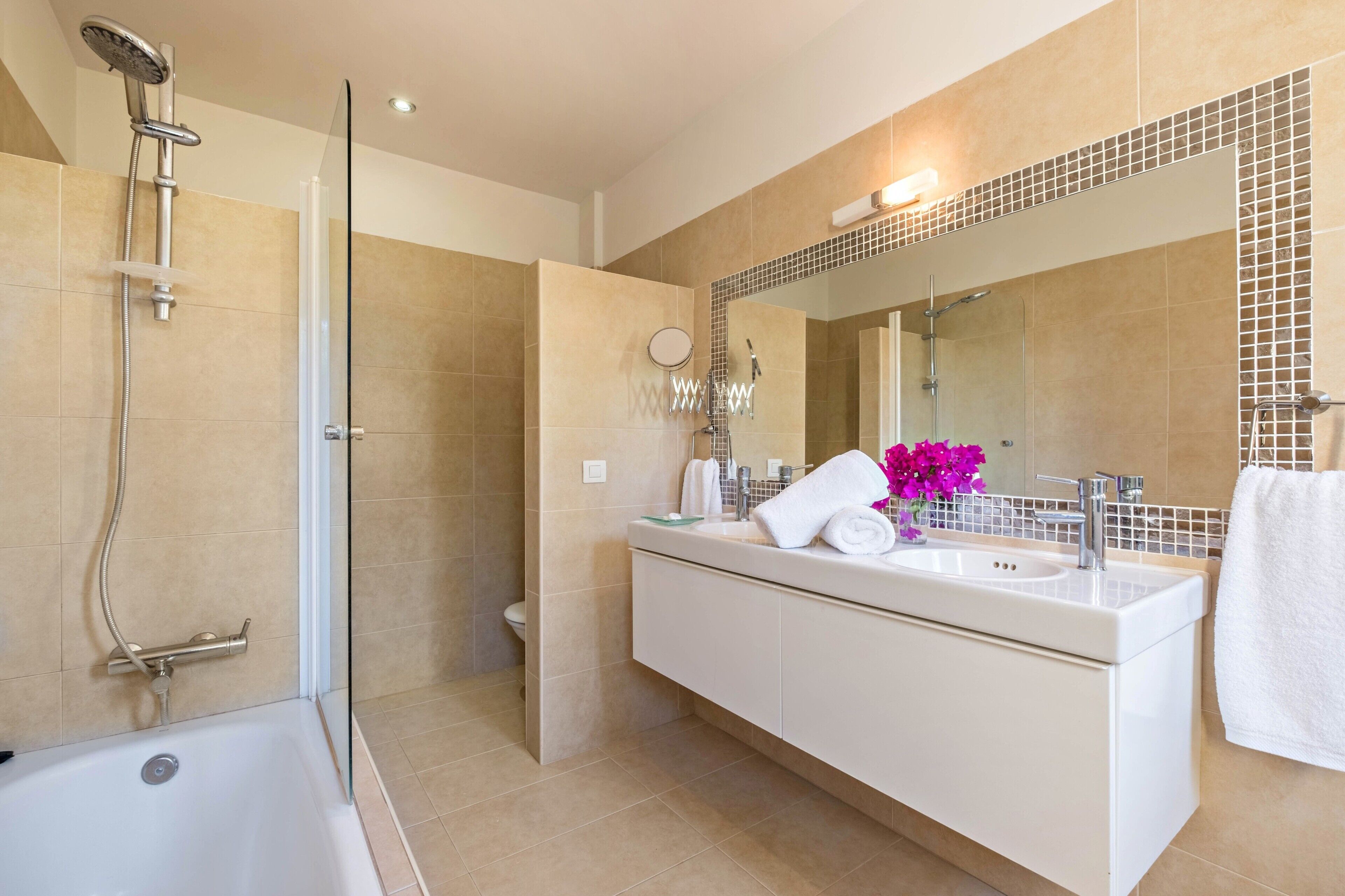 Bathtub, hair dryer, towels