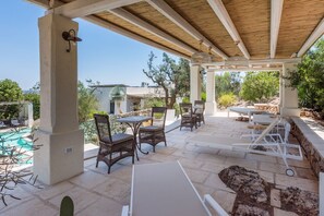 Outdoor dining - Vacation Home “Tia Maria Country Inn - Trilocale 102” with Pool, Terrace & Garden (Racale)