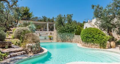 Maison de vacances "Tia Maria Country Inn - Trilocale 102" avec piscine, terrasse et jardin