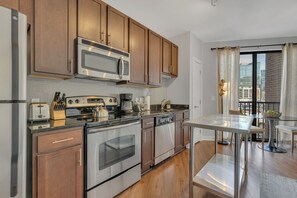 Fridge, microwave, oven, stovetop - Downtown Gulch Apt with Gym (Nashville)