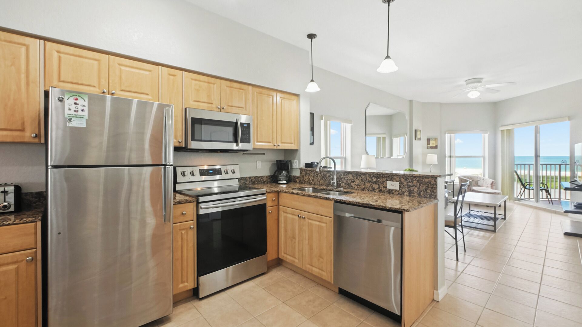 Coffee/tea maker, fridge, microwave, oven