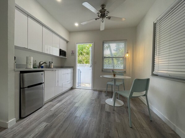 Fridge, microwave, stovetop, coffee/tea maker