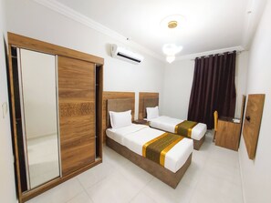 Family Suite | Egyptian cotton sheets, premium bedding, pillow-top beds, in-room safe - Iwan Alandalusia Serviced Apartments - Economic (Jeddah)