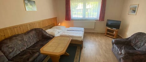 2 dormitorios y cuna de viaje