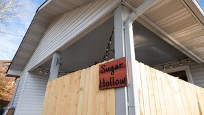 A wooden fence with a sign that reads "Sugar Hollow". - Dog Friendly Home, Arcade Game, Near Pigeon Forge (Pigeon Forge)