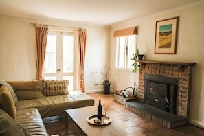 Televisión de pantalla plana, chimenea, Netflix y reproductor de DVD