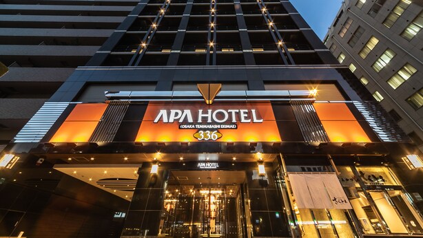 The APA HOTEL with a modern facade, large windows, and a prominent entrance. - APA Hotel Osaka Temmabashi Ekimae (Osaka)