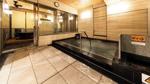 A public restroom with a tiled floor, a sink, and a mirror. - APA Hotel Osaka Temmabashi Ekimae (Osaka)