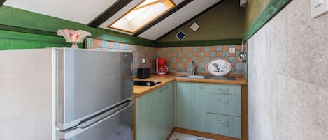 Appartement (A1) | Cuisine privée | Réfrigérateur, surface de cuisson, cafétiÚre à espresso