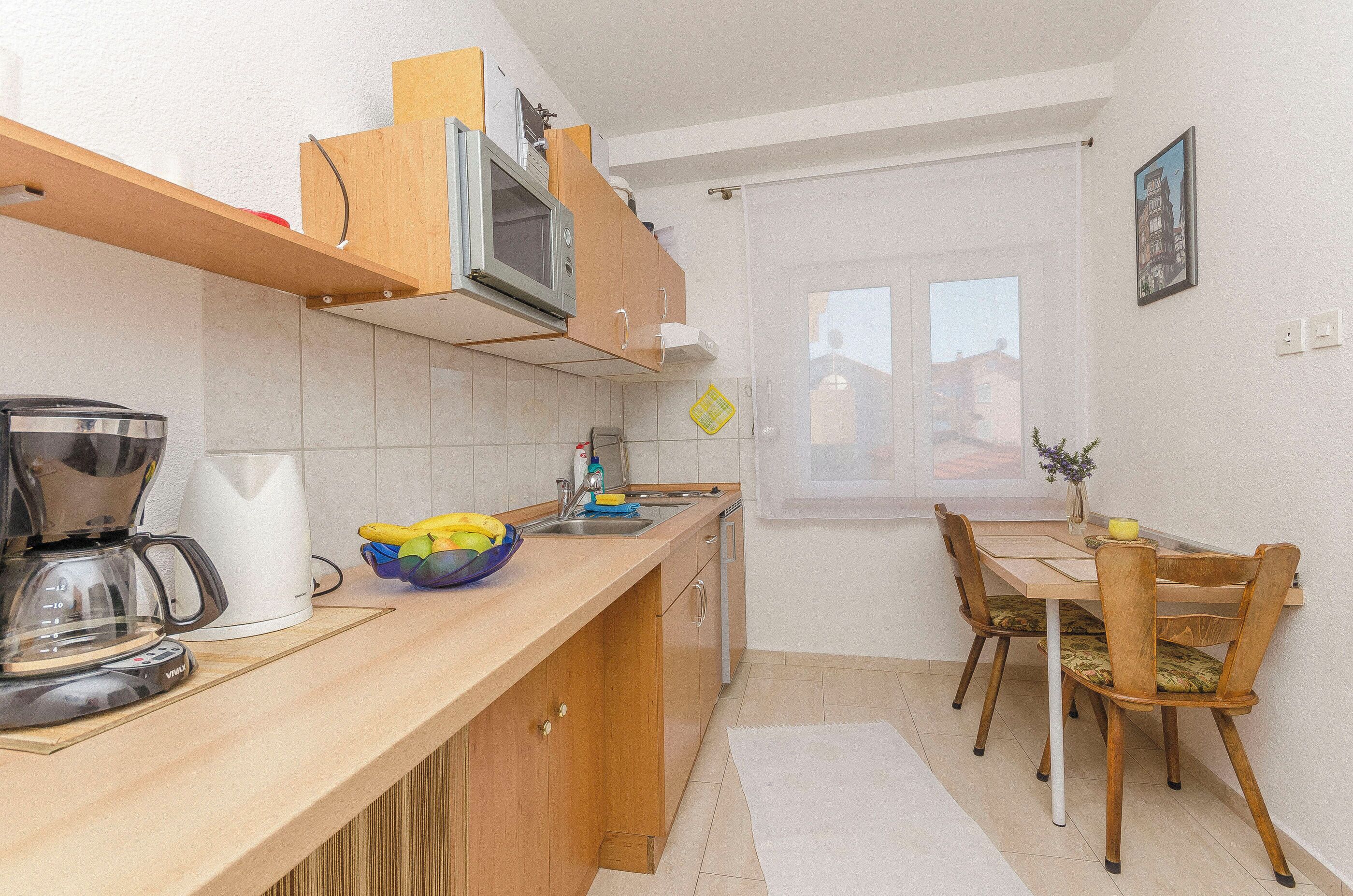 Réfrigérateur, plaque de cuisson, machine à expresso