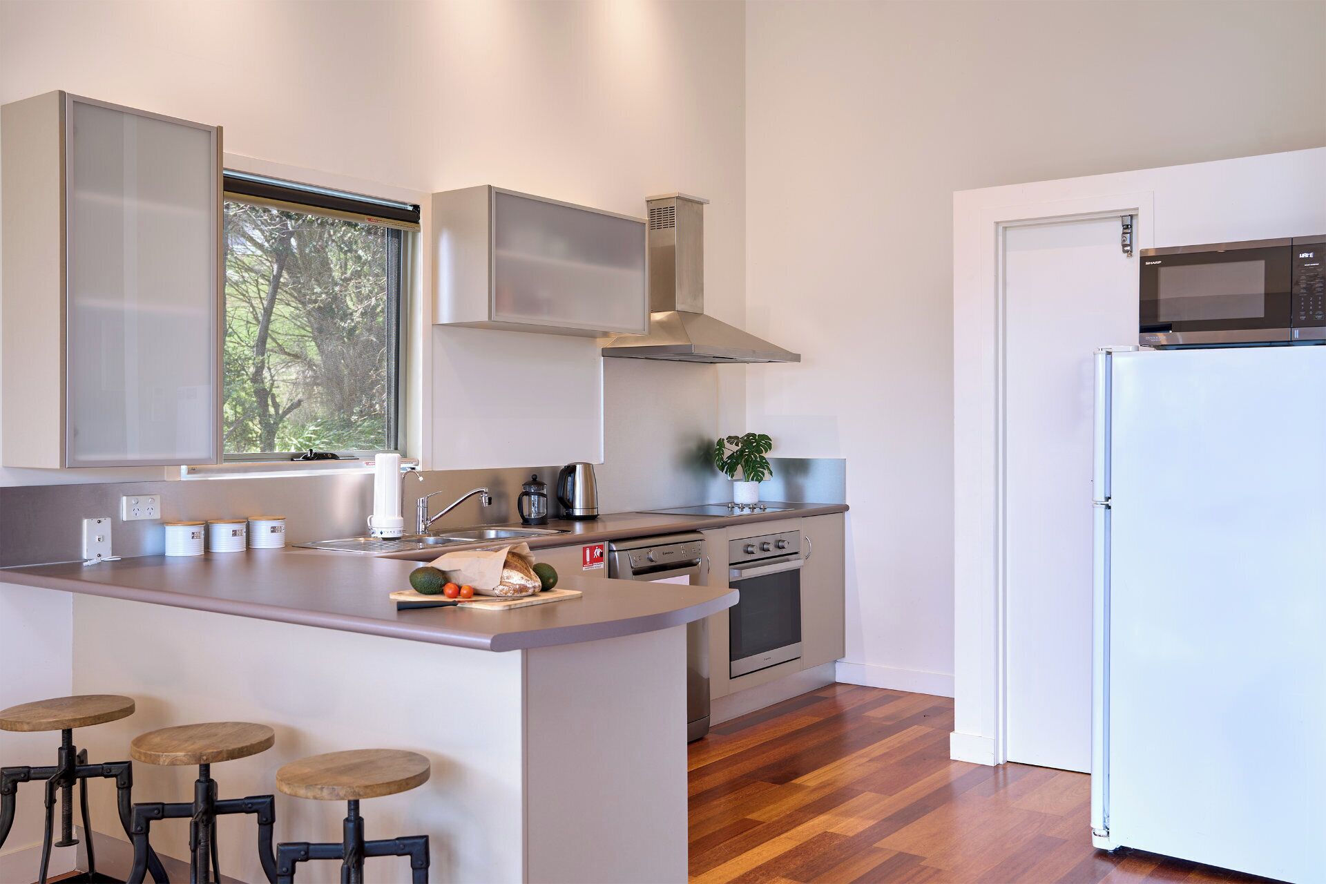 Coffee/tea maker, fridge, microwave, oven