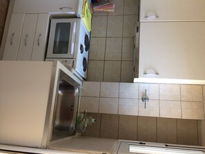 Fridge, oven, electric kettle, cookware/dishes/utensils
