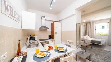 Apartamento (Studio Apartment) | Sala de jantar