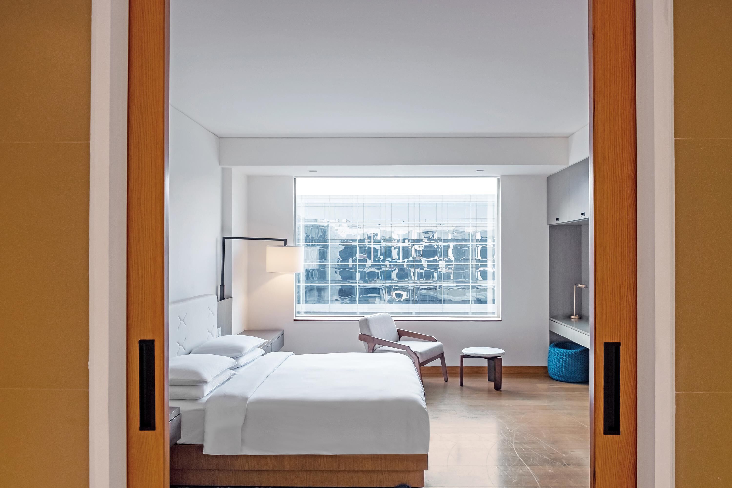 Premium bedding, down duvets, pillow-top beds, in-room safe
