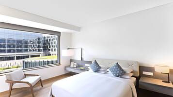 Premium bedding, down comforters, pillowtop beds, in-room safe