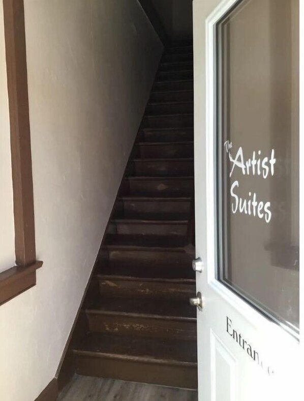 Staircase leads to the entrance of Artist Suites.