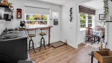 Fridge, microwave, stovetop, coffee/tea maker