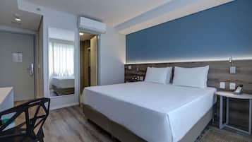 Superior Double Room | Minibar, in-room safe, desk, laptop workspace