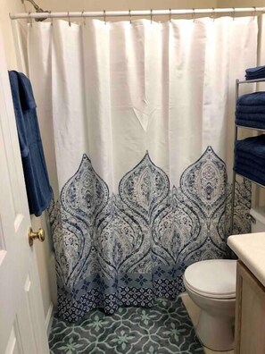 Hair dryer, towels, soap, shampoo