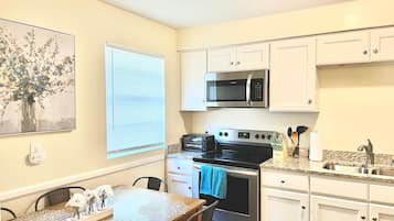 Microwave, toaster, cookware/dishes/utensils