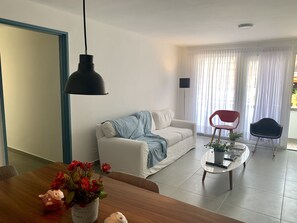 50-inch flat-screen TV with cable channels, TV