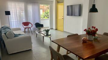 50-inch flat-screen TV with cable channels, TV