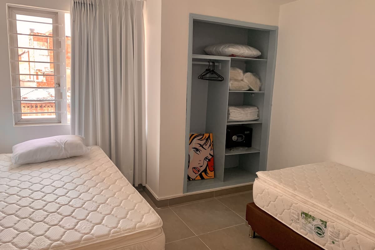 2 bedrooms, laptop workspace, blackout curtains, free WiFi