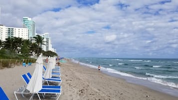 On the beach, sun loungers, beach towels