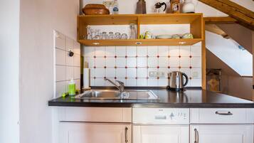 Réfrigérateur, four, plaque de cuisson, lave-vaisselle