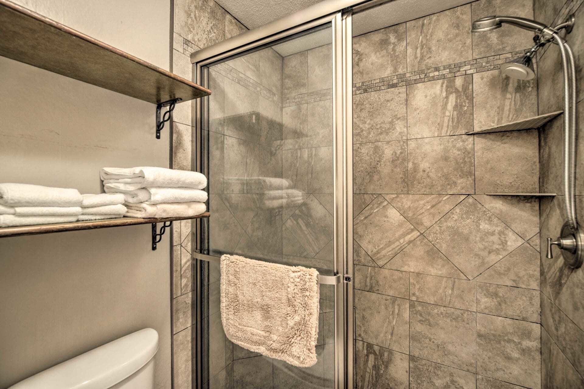 Bathtub, hair dryer, towels, soap