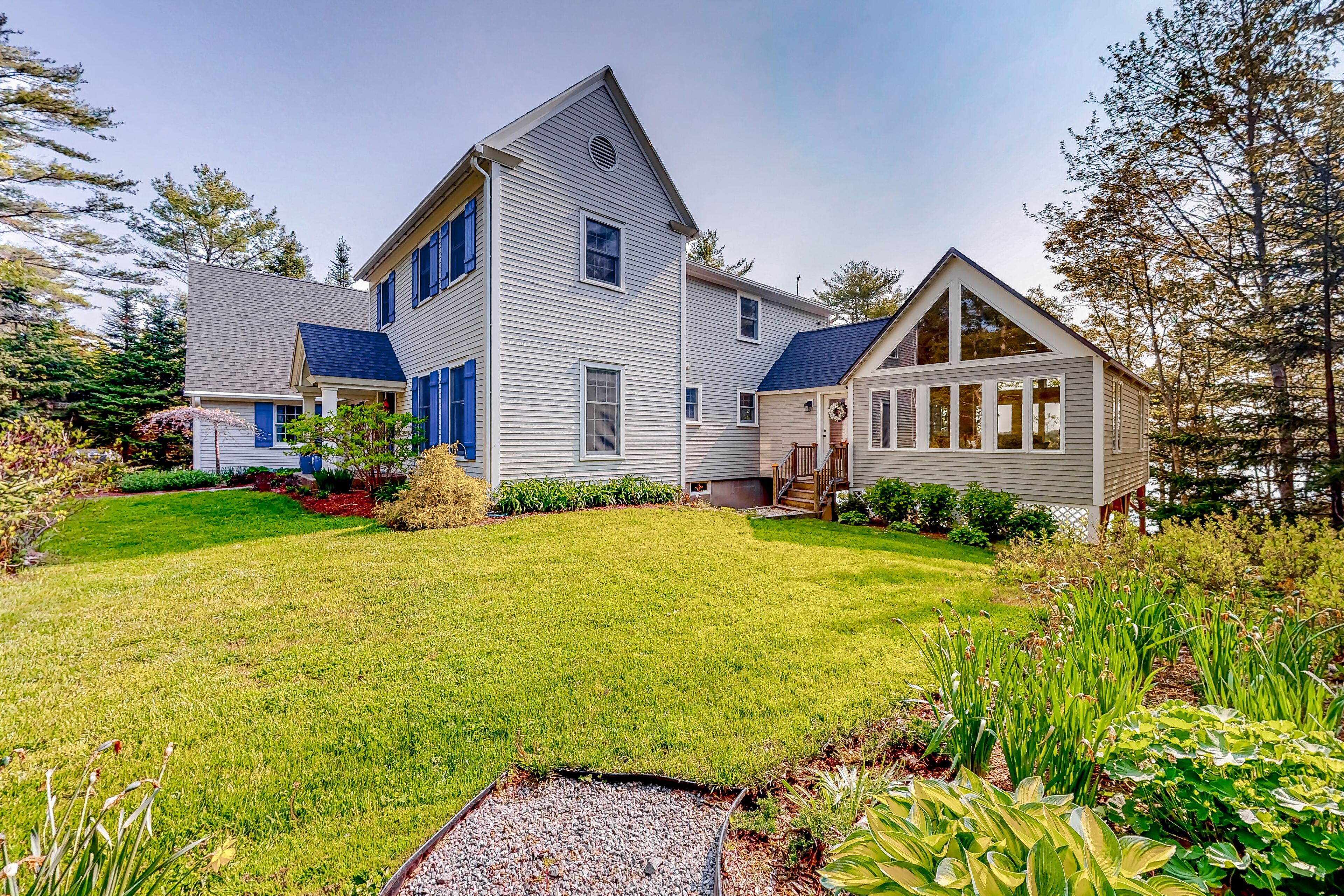 Stunning riverfront gem with private dock, gourmet kitchen, and firepit