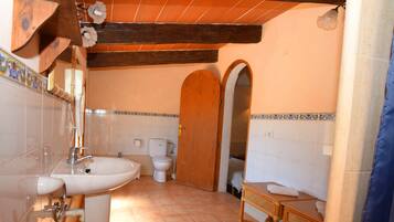 Bathtub, hair dryer, towels